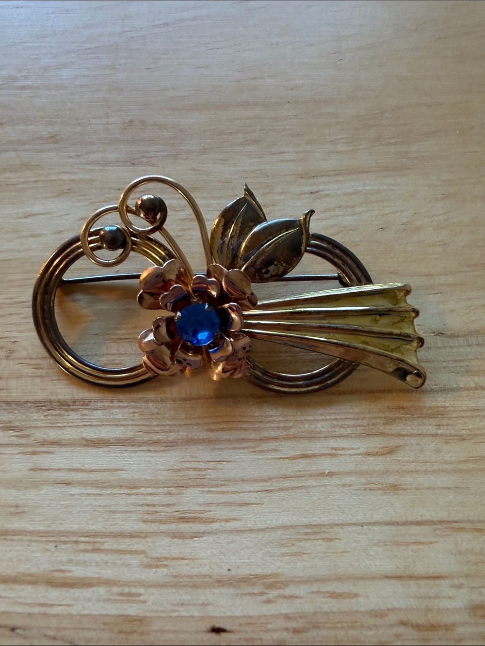 Floral Gold-Tone Brooch with Blue Center Stone
